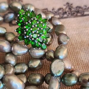 Size 9.5 sterling silver ring with emeralds